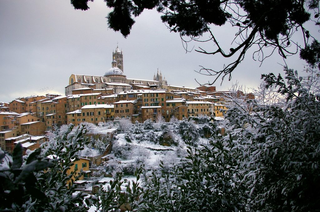 a hilltop town in tuscany in the winter