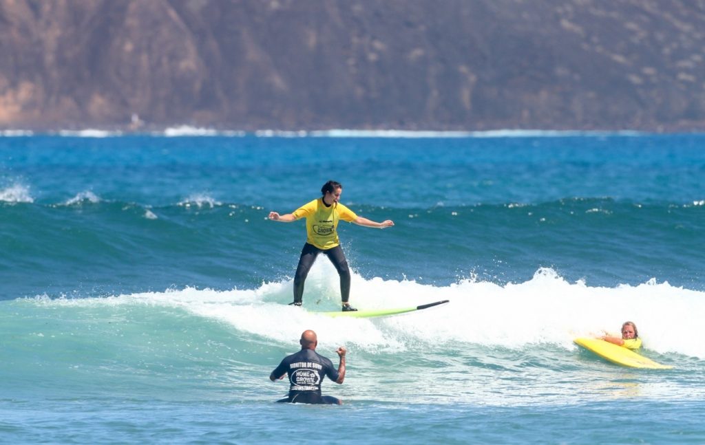 surfer rides the waves in Fuerteventura