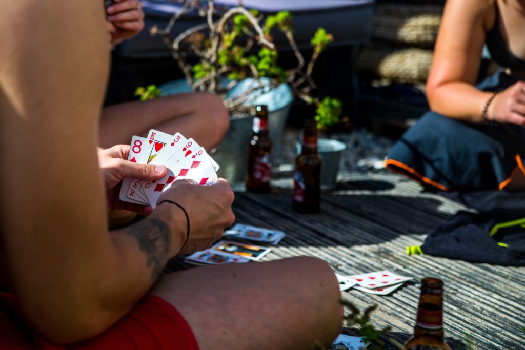 surfers playing cards