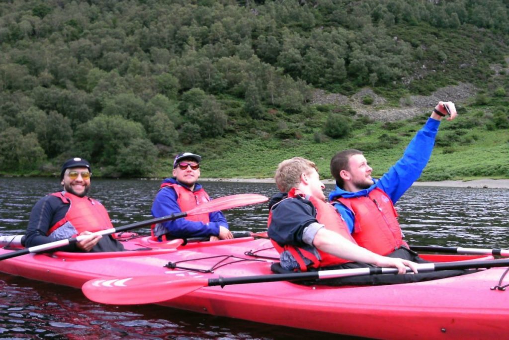 people kayaking in the lake district