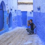 photographer in blue Morocco street