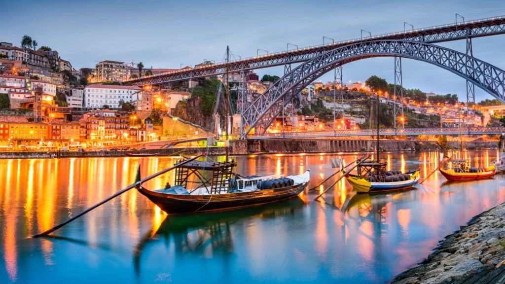 boat on river in porto at night