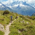 hikers walking through alps in france