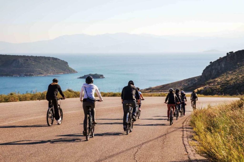 Group cycling on the coast of Napflio