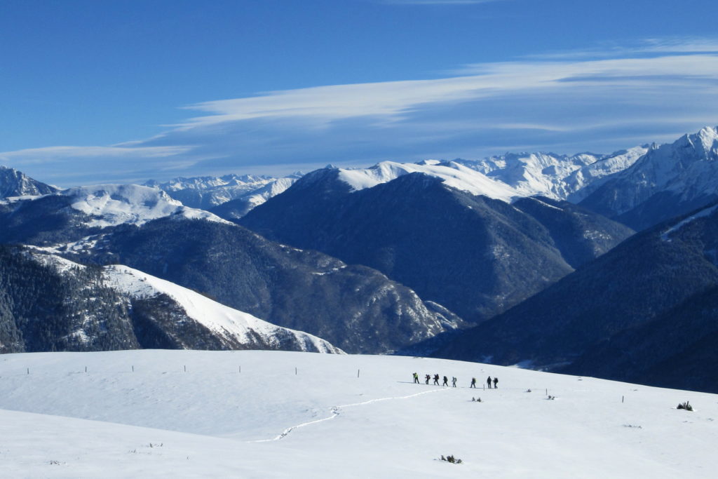 people snowshoeing in the french pyrenees