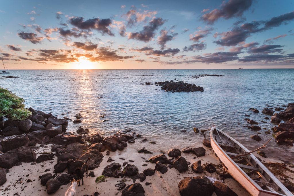 boat and sunset in mauritius