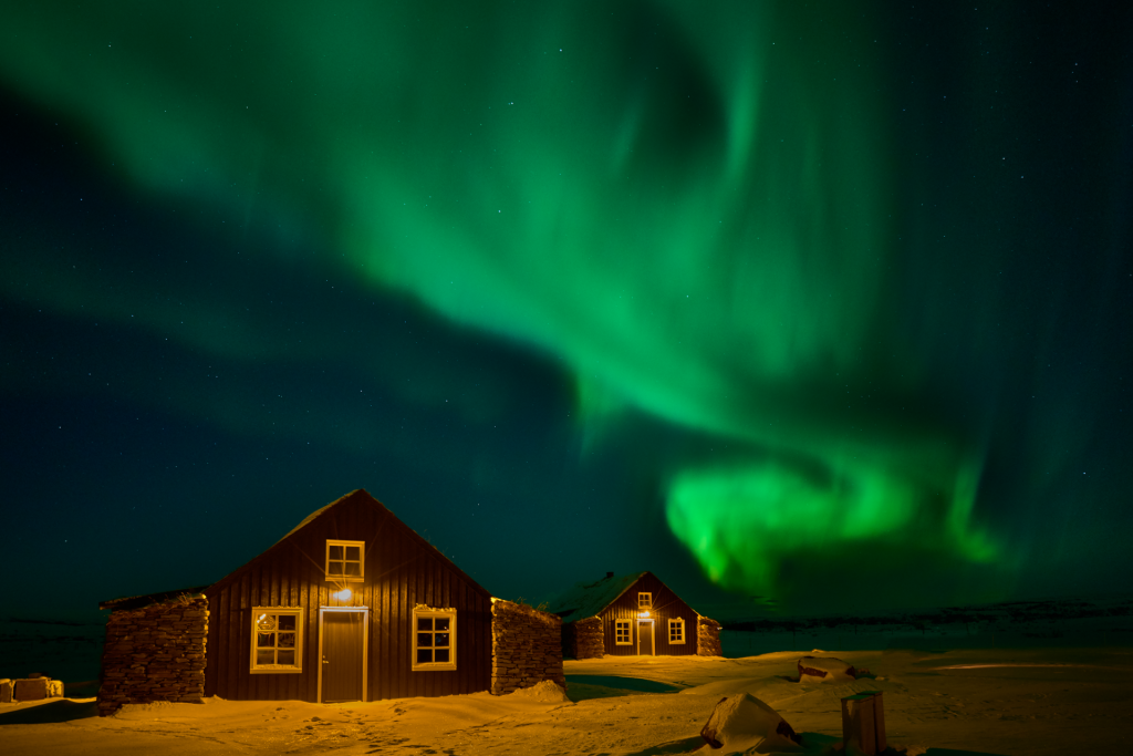 eco lodge retreat in iceland under the northern lights