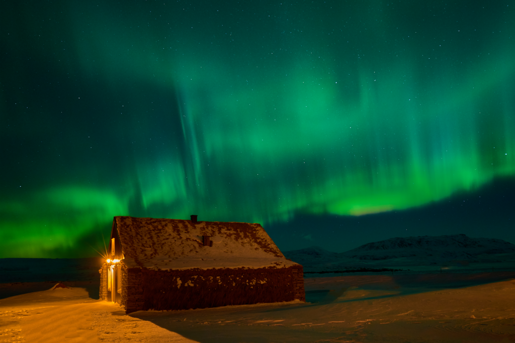 eco lodge retreat in iceland under the northern lights