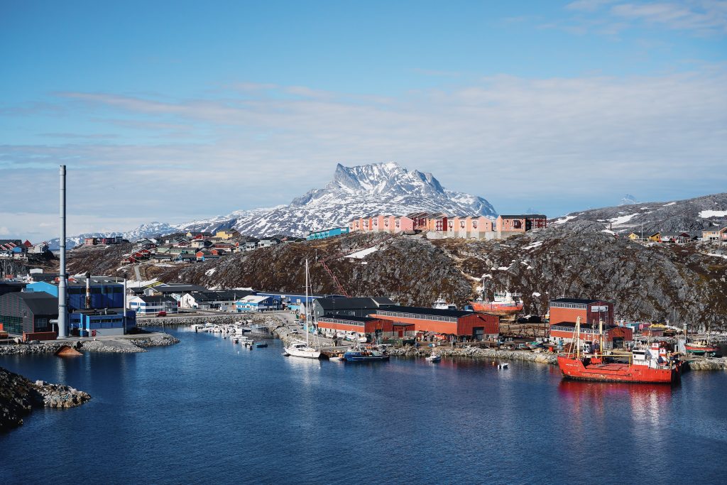 mountain and town in greenland